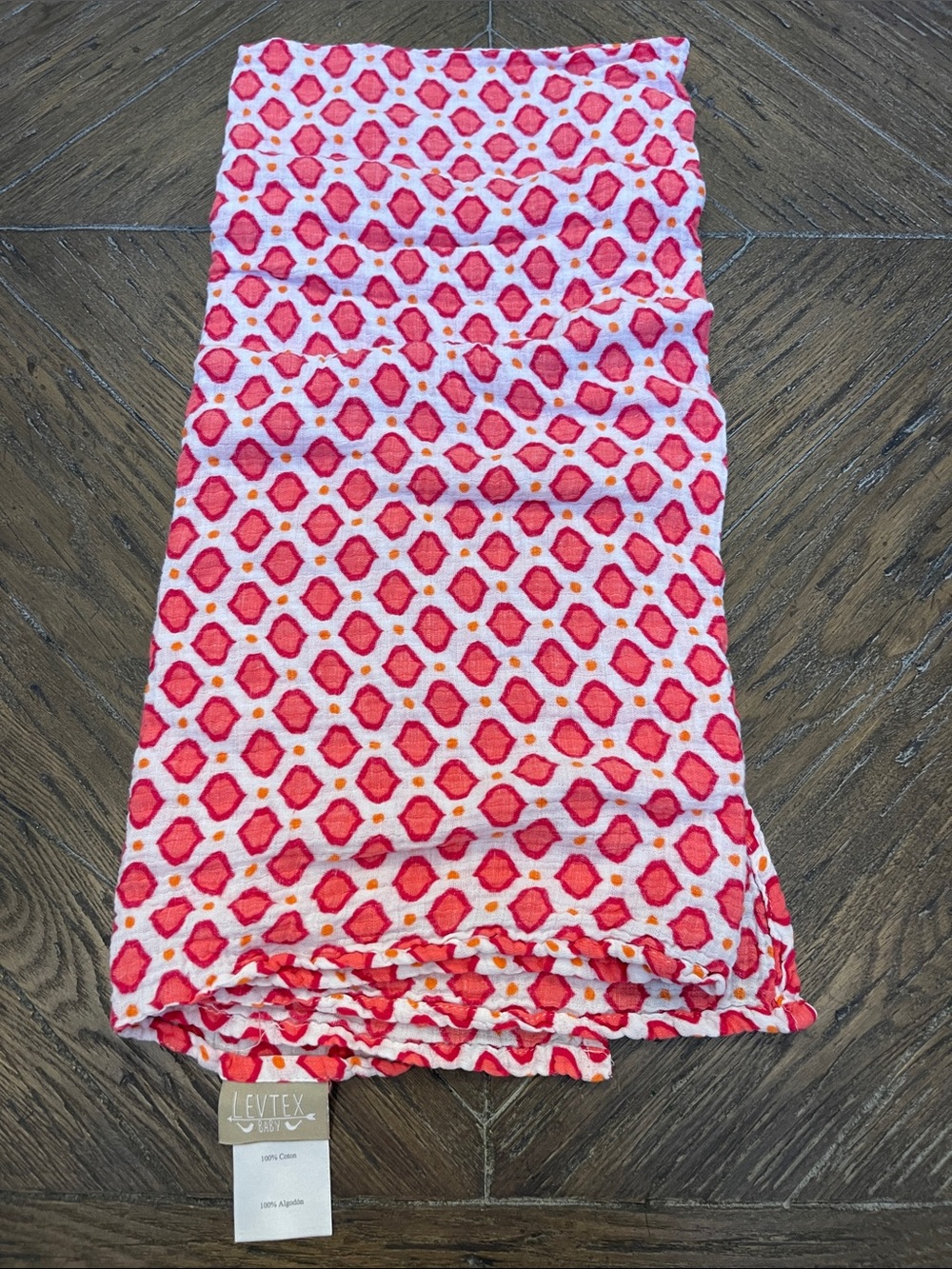 Levtex Muslin Baby Blanket with Pink and Orange Pattern